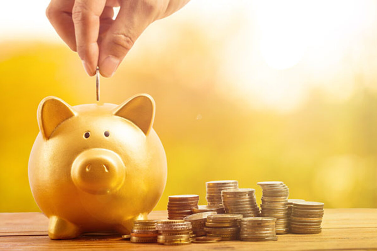 Piggy bank with gold coins